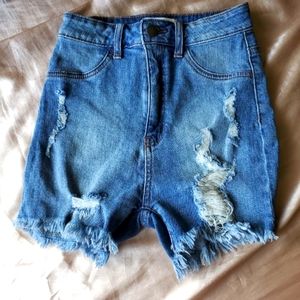 High waisted ripped denim